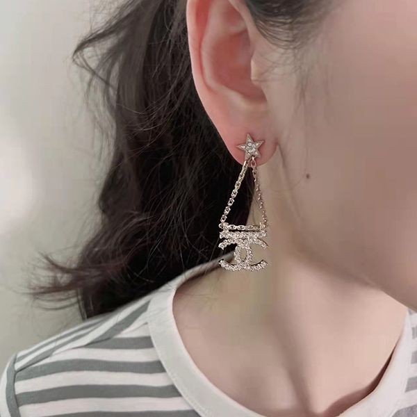 定番シャネル スイング ピアス 本物 CCロゴ スター クリスタル ゴールド AB8068B07810NH432